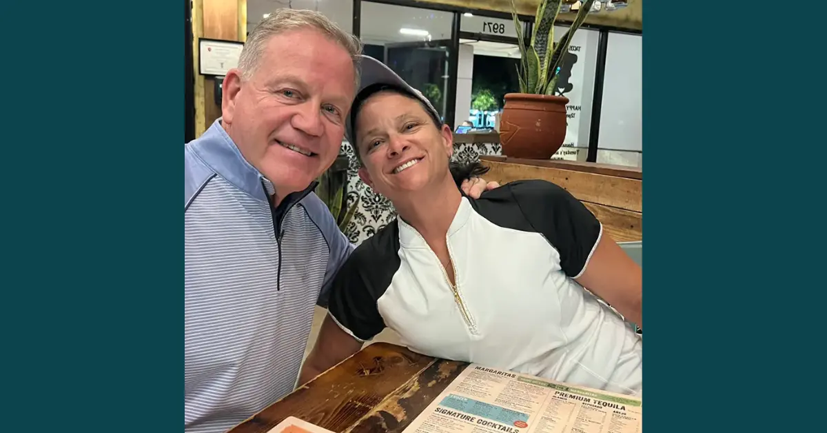 Kelly and his wife at dinner table