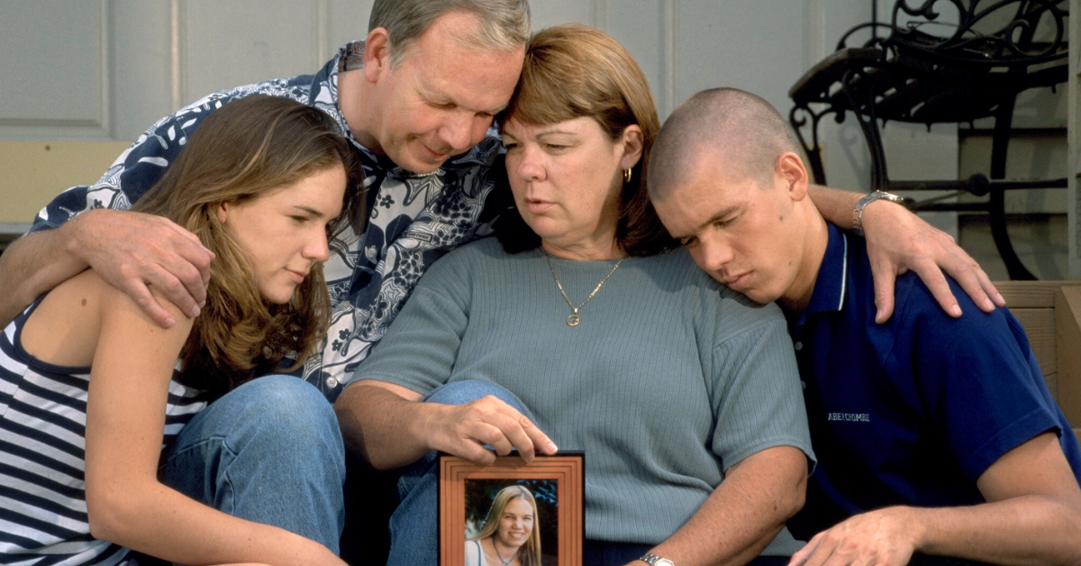 family being sad over the death of their daughter